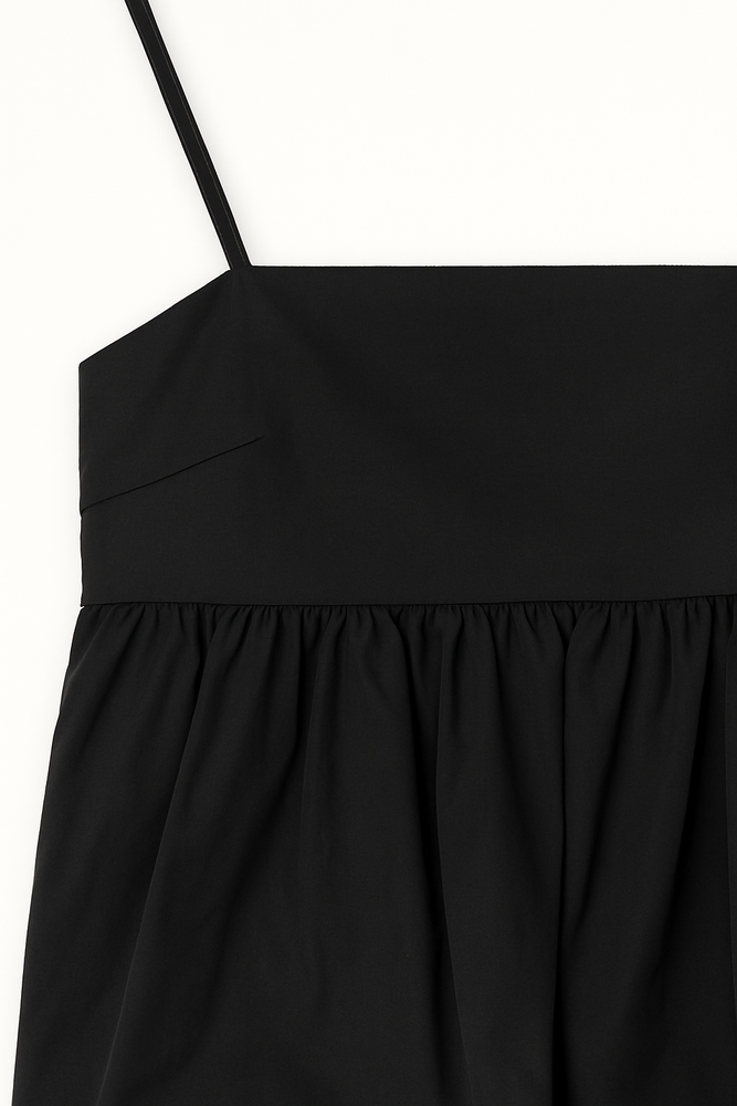 
                  
                    Blusa Globo con tirantes finos
                  
                